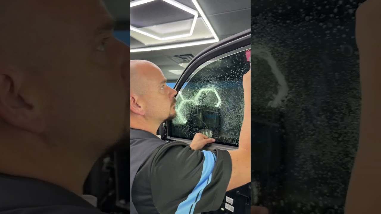 Wayne applying ceramic window tint Chattanooga TN