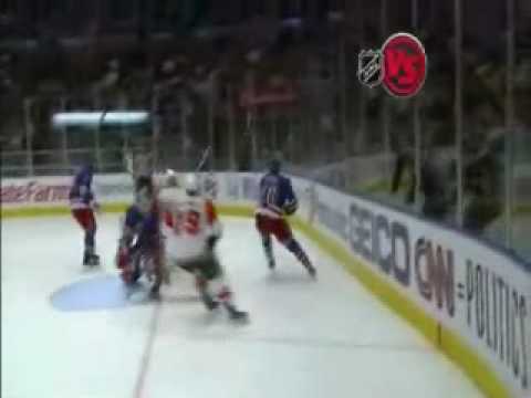 Marc Staal counterhits Scottie Upshall