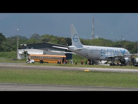 Honduran migrants return on deportation flight from US | AFP