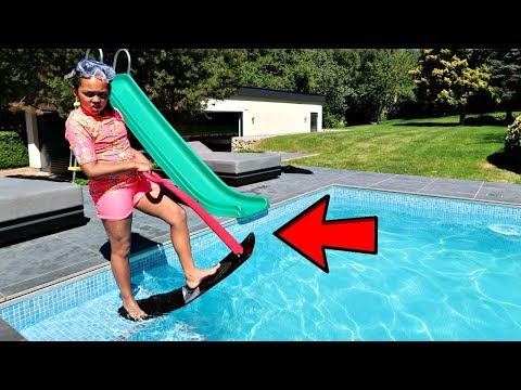 TIANA'S SURFING IN OUR SWIMMING POOL!!