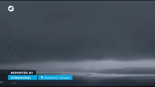 A huge black cloud leaves Istanbul, Turkey, in darkness