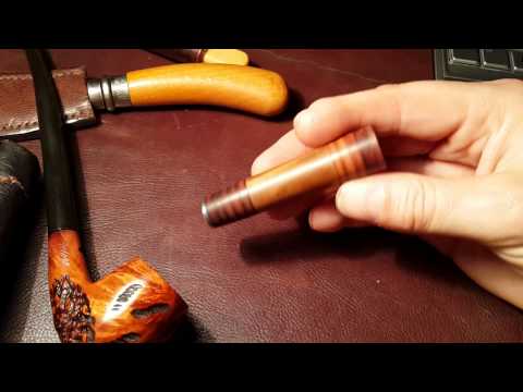 I make a leather and teak pipe tamper