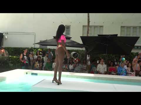 pretty girls at the swimwear runway on podium at the swimming pool Miami Swim Week Flying Solo 2022
