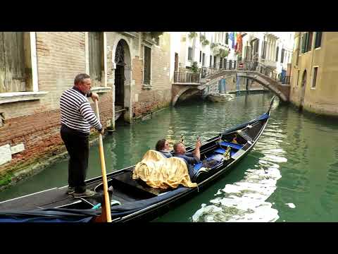 Venice Italy  - Beautiful canals scenery, Grand Canal, Rialto Bridge and gondola boat rides