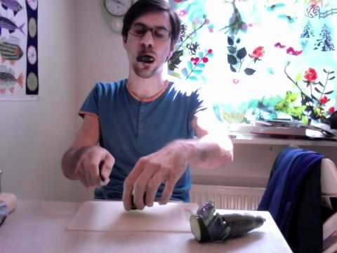 Filip Jers plays harmonica and cuts cucumber