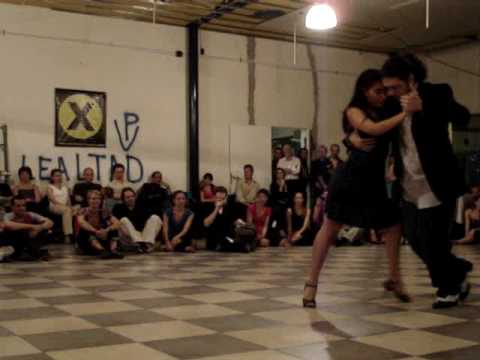  Federico Naveira  and  Corina Herrera  are  dancing  to  a  tango