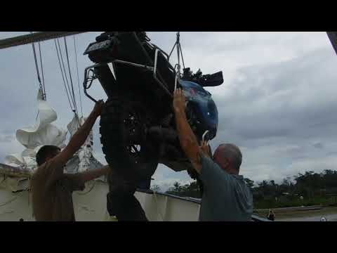 2 ride the world   unloading Lisa Thomas' bike in Panama