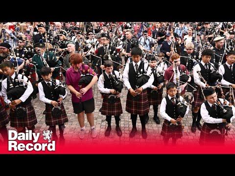 Bagpipers claim world record with AC/DC's 'It's a Long Way to the Top'