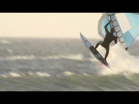 Will this become a new sport?  WING SURFING WITH A KITE BOARD @ BIG BAY SOUTH AFRICA