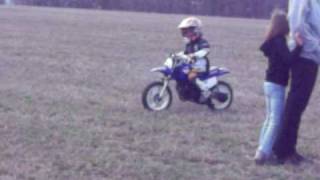 preview picture of video 'David's first PW 50 ride around the yard'