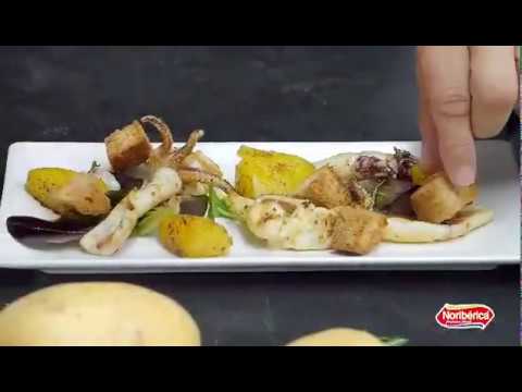 Insalata di calamari scottati e pane tostato all'olio