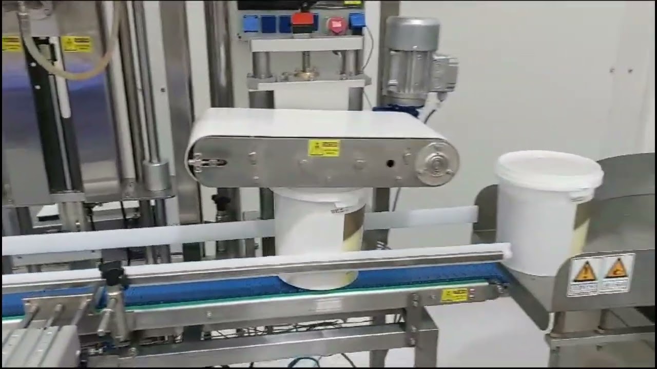 Integrated Filling line with Denester, Filling, Capping and Coding by TADBIK