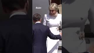 Moment Brigitte Macron 'rejects' husband's help leaving plane after viral slap vid