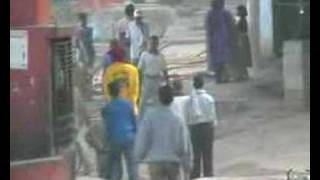 Riot in Varanasi India, and a Girl with a bottle