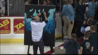 Guy Sings National Anthem While Painting Picture