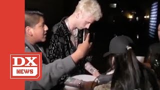 Machine Gun Kelly Signs Autograph Then Immediately DESTROYS It After Fan Brings Up Eminem