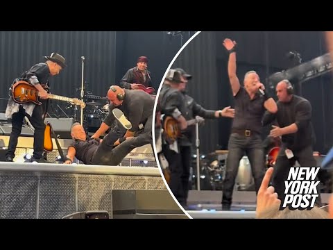 Bruce Springsteen falls on stage, band rushes to help after wipeout | Page Six