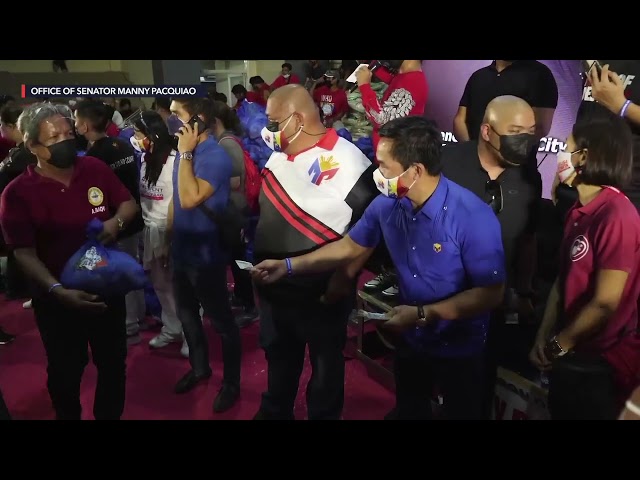 Pacquiao, ‘adopted son’ of Batangas, comes home to give cash aid