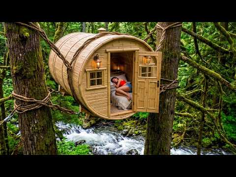 Solo Girl Builds a Bamboo Barrel Pod Between Trees Over a River