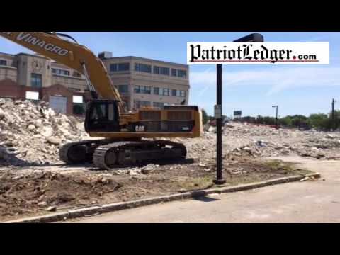 The Quincy Center parking garage on Ross Way is demolished to make way for development of the parcel