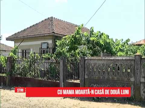 Cu mama moartă-n casă de două luni