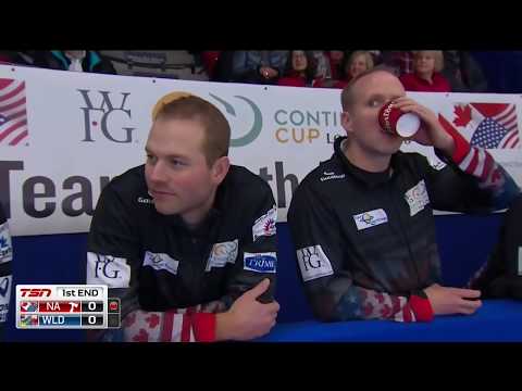 Brad Gushue uses his fresh brush pad on Lisa Weagle's rock