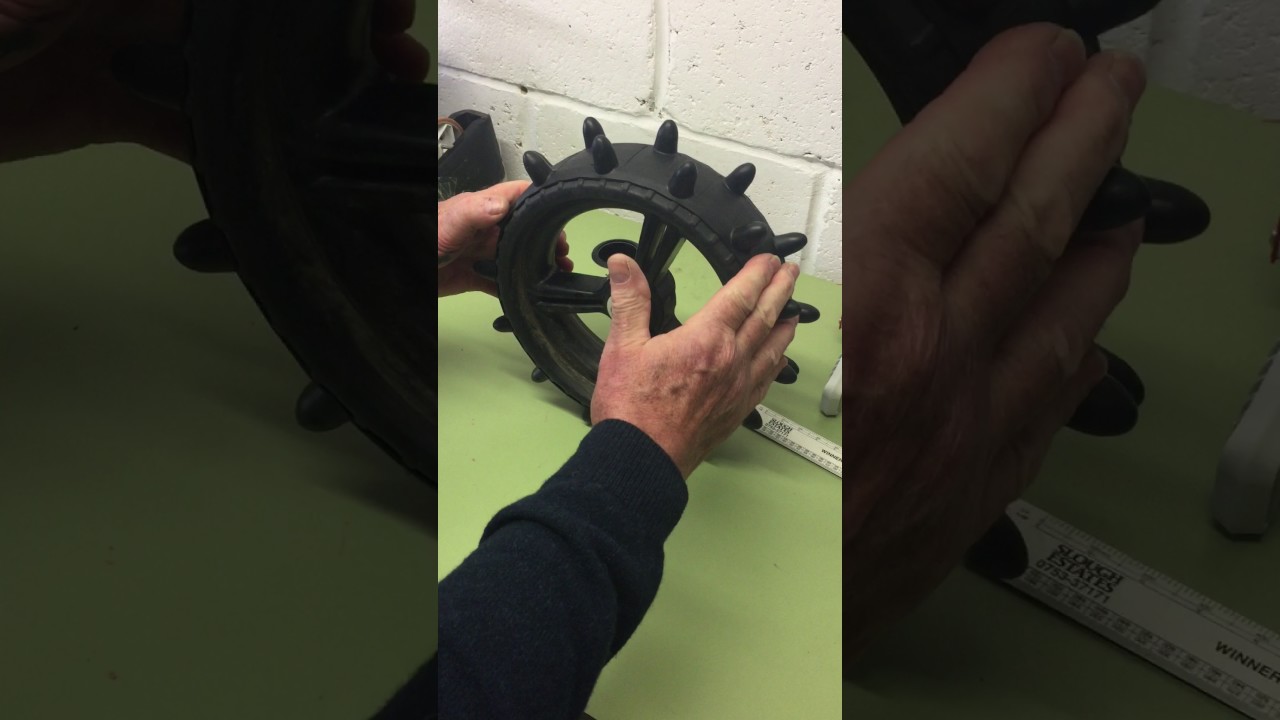 Fitting a Hedgehog wheel cover to 10.5 trolley wheel by JLGOLF LTD.