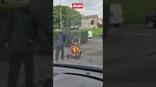 Bizarre moment man is filmed pushing burning pram along Glasgow street #Shorts