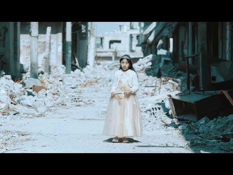 Syrian blind girl sings song of hope in remains