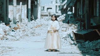 Syrian blind girl sings song of hope in remains