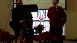 Tanner & Pastor Greg singing Christmas Shoes 12-7-08