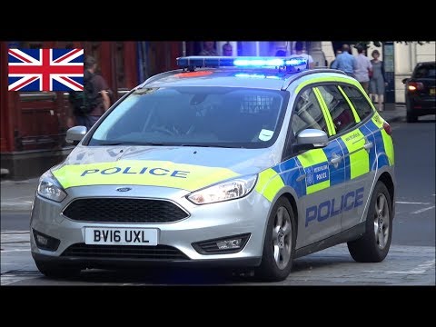 Police car responding blasts bull horn for car getting in the way + siren and lights
