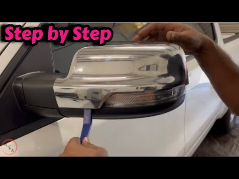 How to remove the chrome trim on the side mirror of a Ram truck