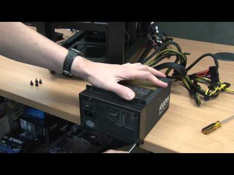 Installing the Cooler Master Silent Pro 80 Plus Gold PSU within a Cosmos 2 Ultra Tower Case