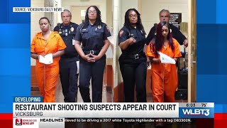 Two arraigned after woman shot in bathroom while police chief dined at same restaurant