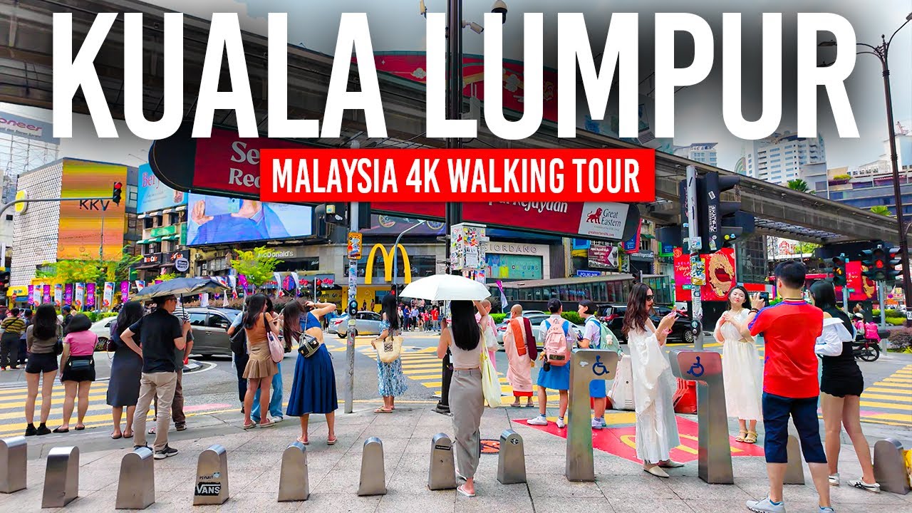Immersive street-level walking tour through Kuala Lumpur Bukit Bintang, Malaysia, showcasing authentic urban landscapes, local architecture, and the vibrant atmosphere of the city's neighborhoods