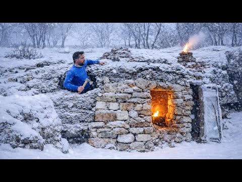 Trapped in mountain snowfall| a cave survival shelter with  fireplace in extreme weather 