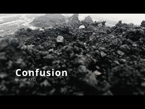 Black-and-white photograph of a rugged lava field, video titled "Confusion," music by KFO.