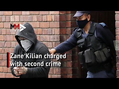 Dozens of armed police officers escort Zane Kilian at Cape Town court