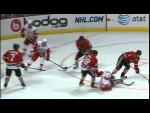 Ruslan Salei gets elbowed by Duncan Keith