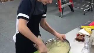 Noah Schnapp cooking on sets of Abe