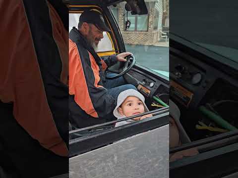 Tony and Jace riding the old buggy while I walk to get the eggs