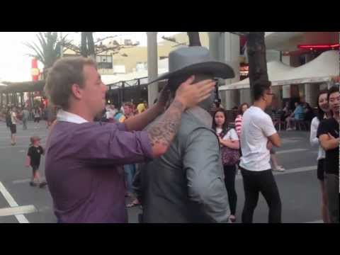 Funny stupid videos - Guy gets punched by street performer! (Original)