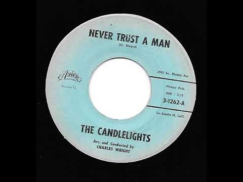 Rare Girl Group 45 on ARIES by THE CANDLELIGHTS titled 'NEVER TRUST A MAN."