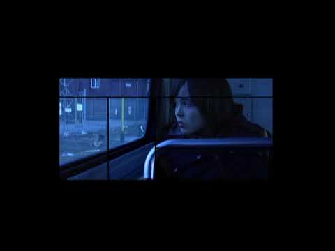 Trailer end-card over city lights — the album’s nocturne mood carrying into the credits