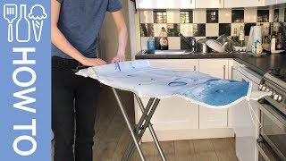 How to change an ironing board cover.
