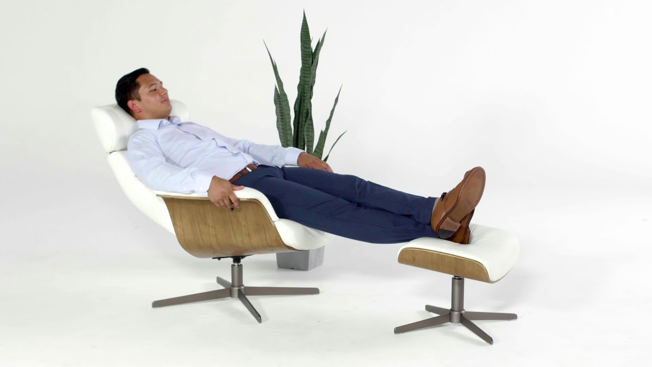 Watch video Amala Leather Reclining Swivel Chair & Ottoman | Living Spaces Now Amala Leather Reclining Swivel Chair & Ottoman | Living Spaces