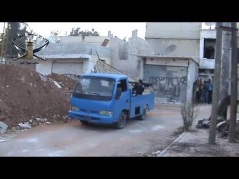 استهداف تحصينات قوات النظام في حاجز التأمينات في درعا المحطة بواسطة قاذف بي 10 من قبل كتيبة اكناف العمري