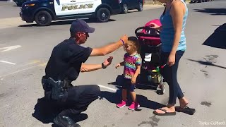 Little girl says hi to cops then they realized the