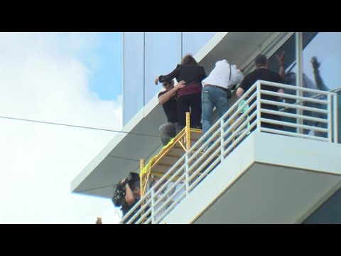 Nik Wallenda and his mom tightrope walk in Florida